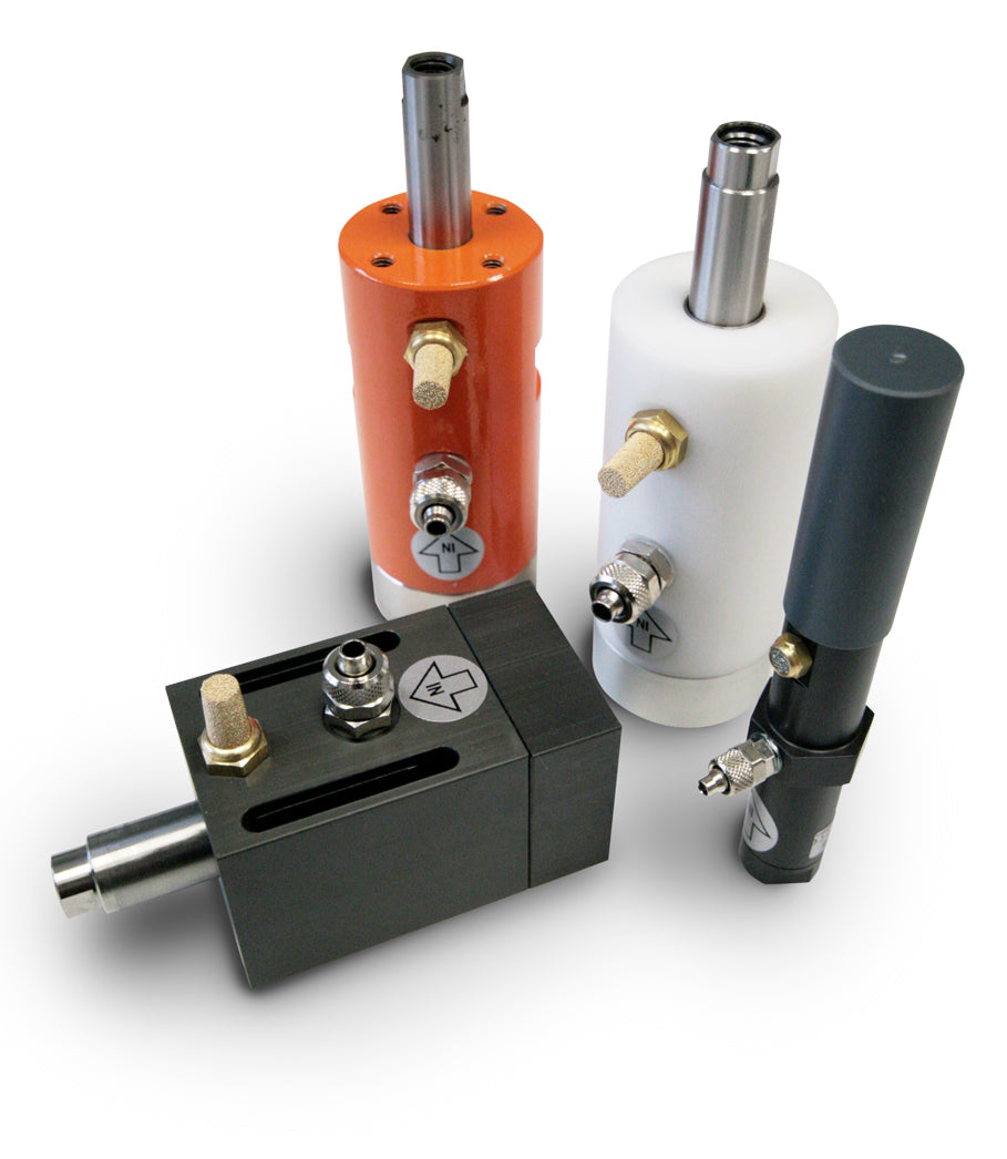 Pneumatic linear vibrator for feeders and channels